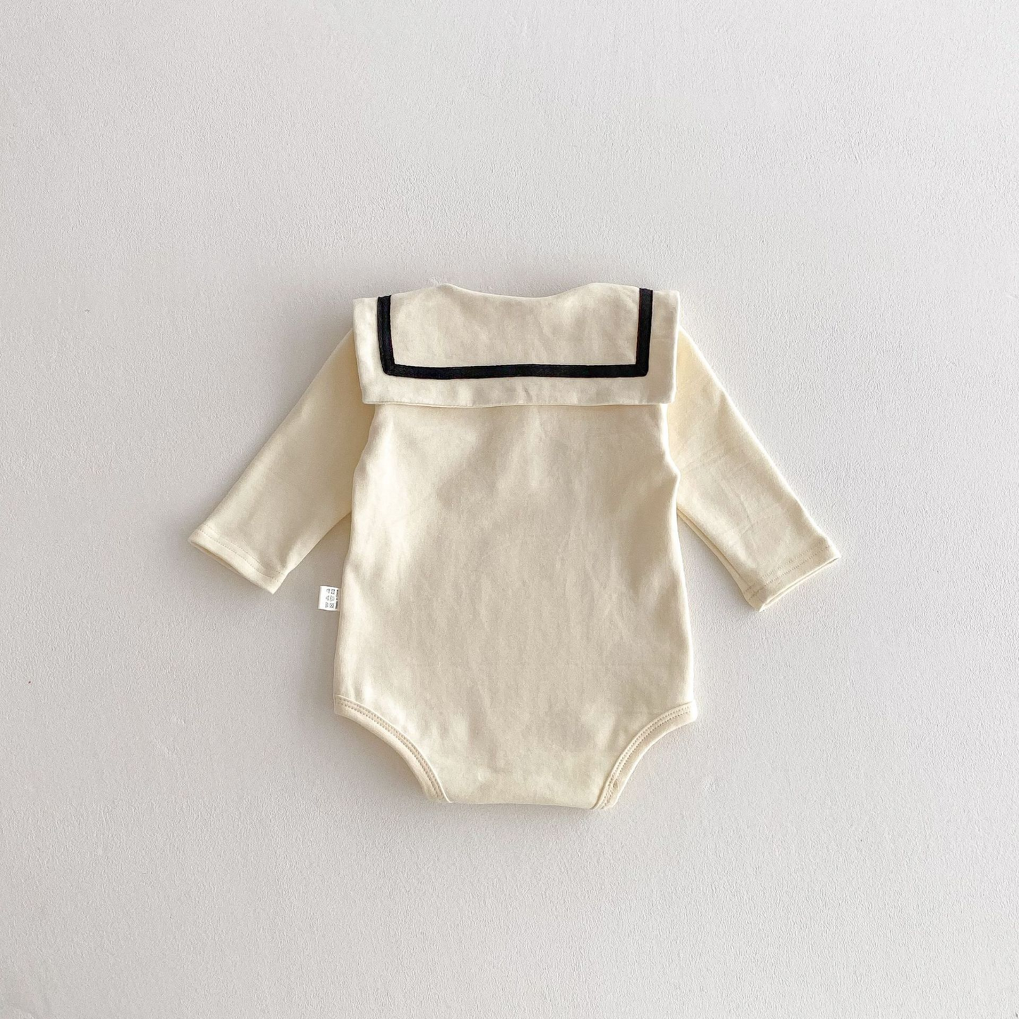 大きめ襟長袖ロンパース wrw25aw090