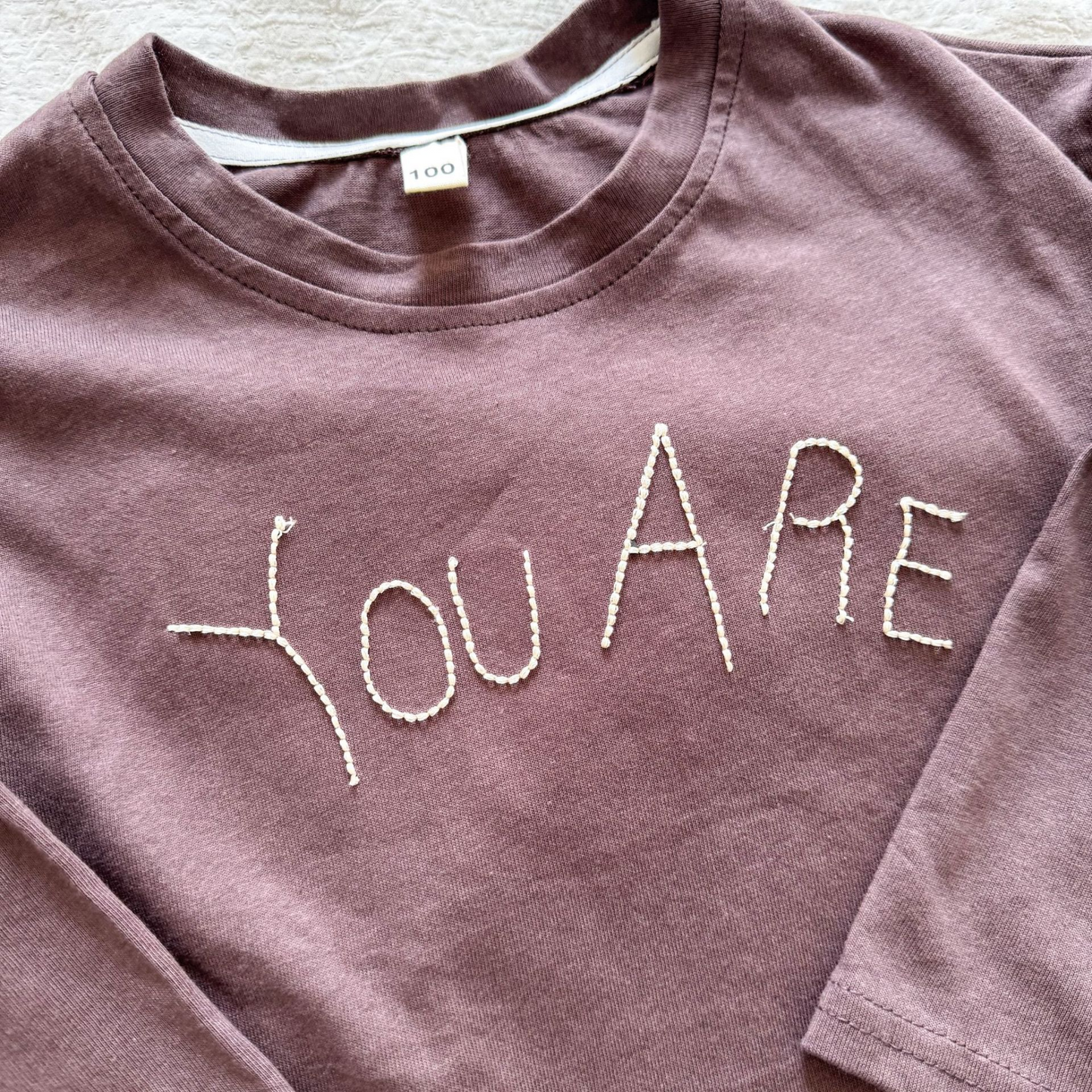 【メール便OK】ロゴ刺繍ドロップショルダーロンT  wrw25aw088